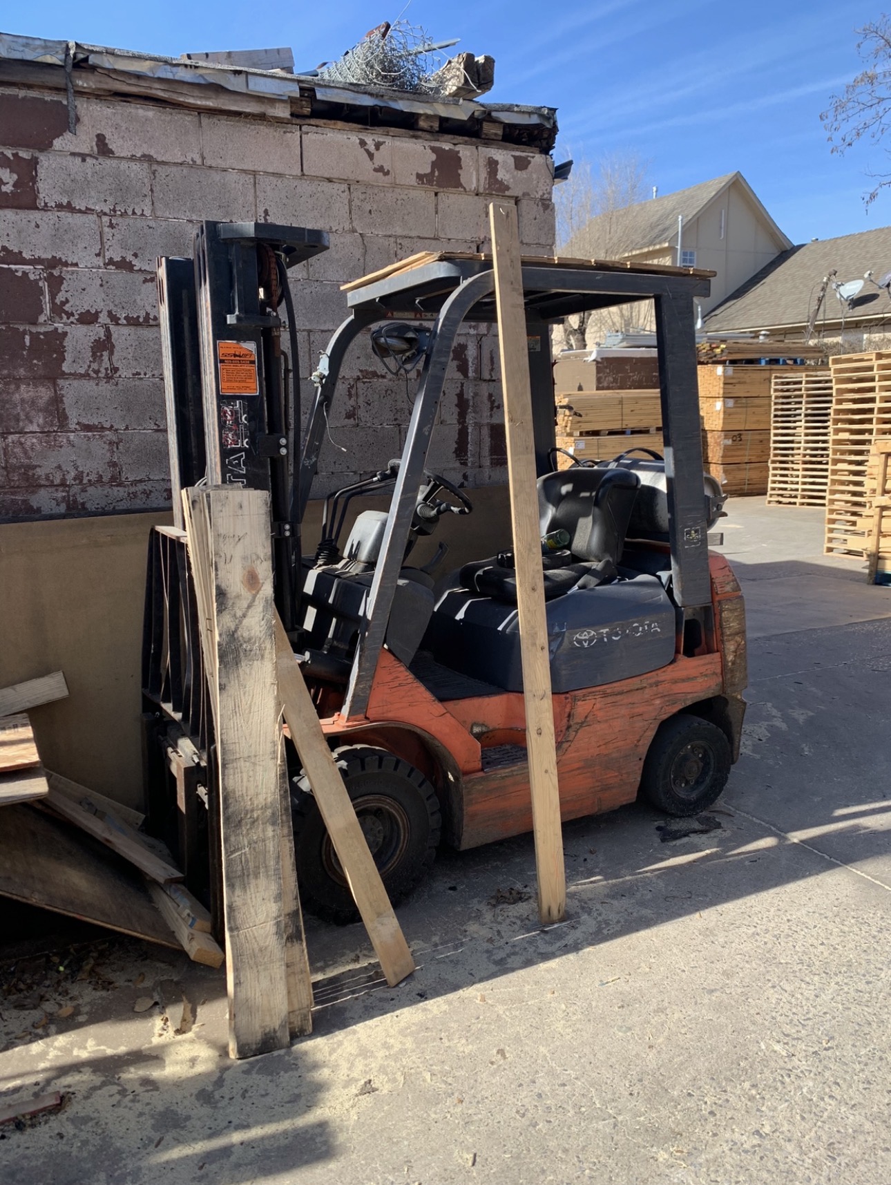 Specialty forklift sitting idle in a yard and taking up valuable space