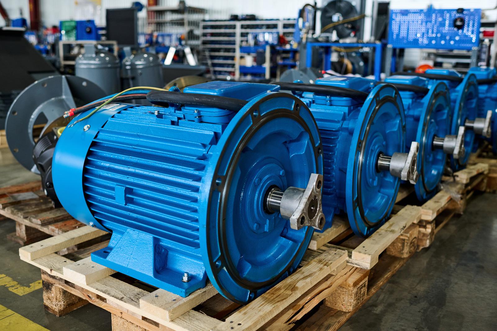 Rows of new cylindrical industrial machine parts representing clean quality surplus rotating equipment inventory